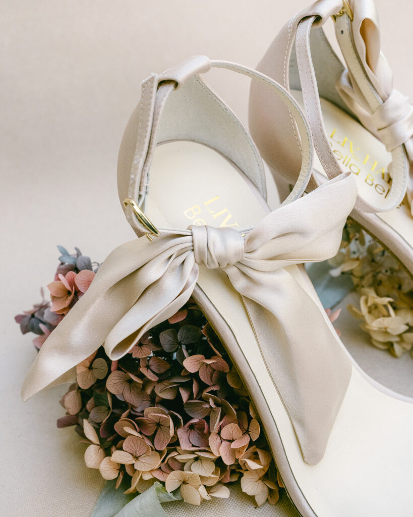Bella Belle Mariee bridal shoes with bows by Serenity Photography