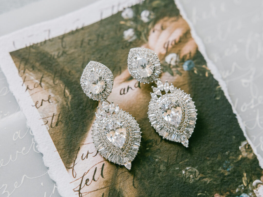 The White Collection big drop bridal earrings with Papier Handmade wedding invitation